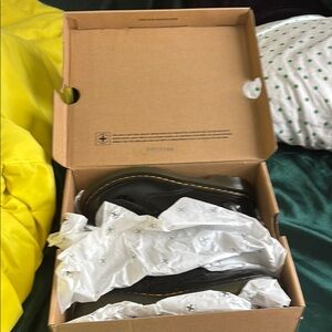 Dr. Martens Black Leather Boots with Yellow Stitching